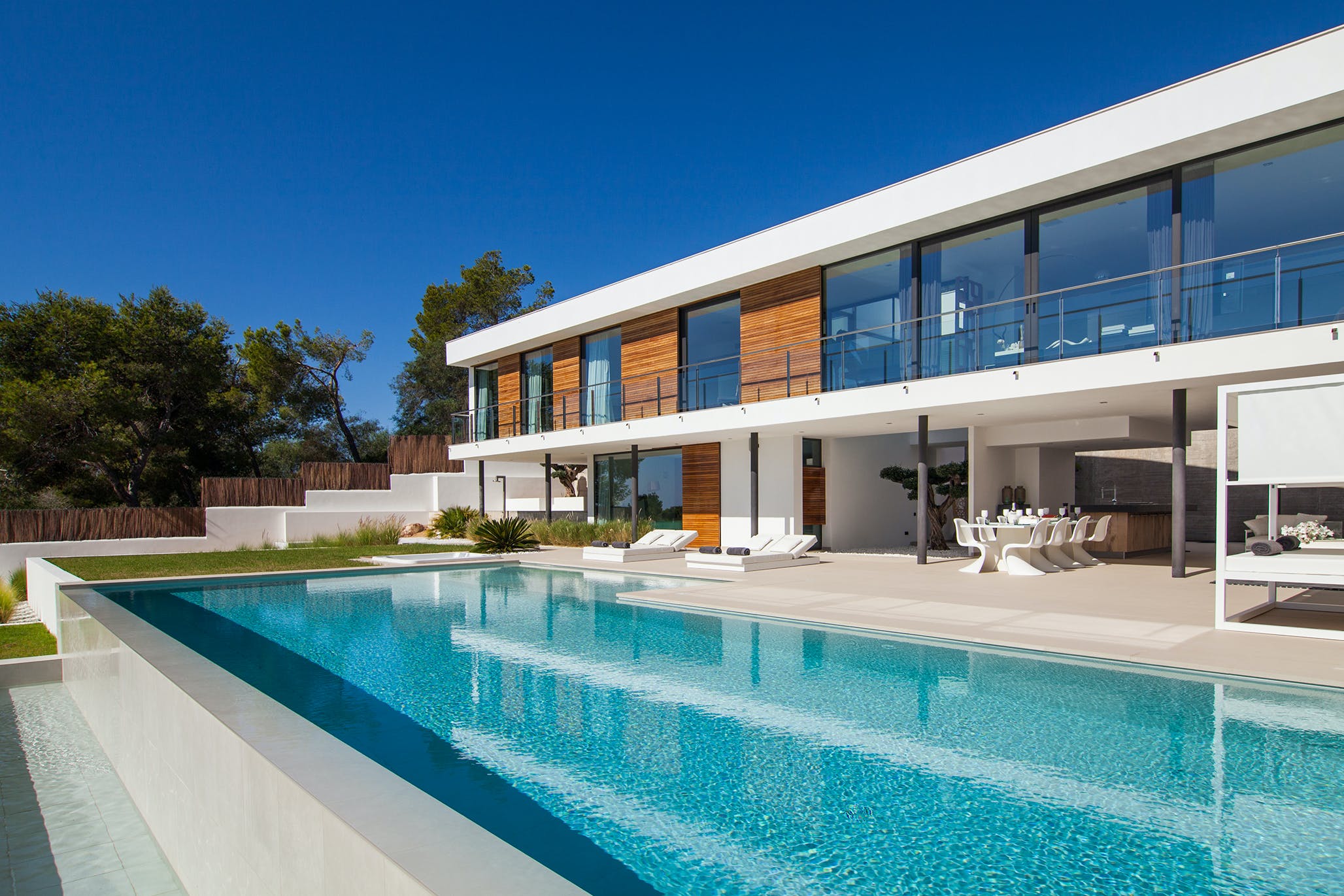 Luxury Villa with white exterior and swimming pool